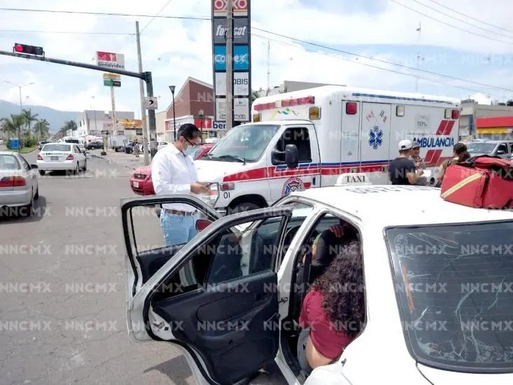 Mujer herida en taxi